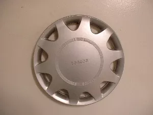 #MZ156518 | Mazda 323 | 1990-1995 | 13” | OEM | Silver
